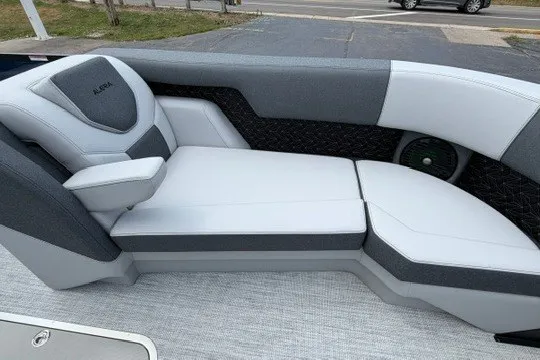 Slide: The Image of Luxurious seating on a 2027 Alera M25Q boat, featuring sleek gray and white upholstery. - 66