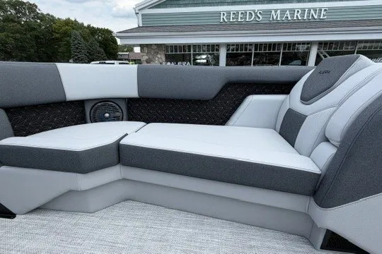 Slide: The Image of 2027 Alera M25Q boat interior with gray seating at Reed's Marine. - 56