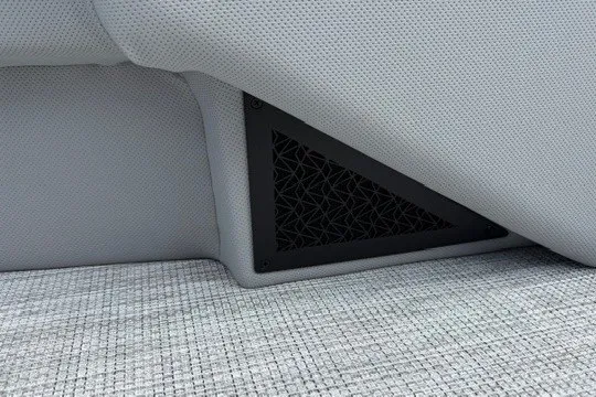 Slide: The Image of Gray interior of Alera M25Q 2027 with triangular black vent detail. - 55