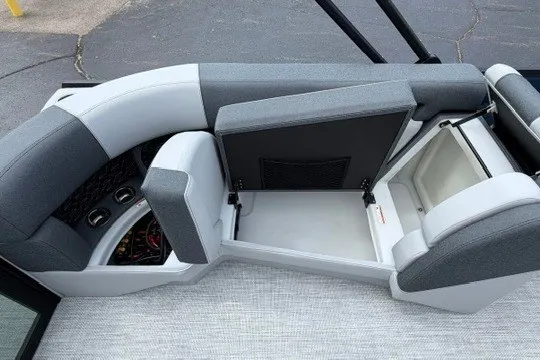 Slide: The Image of Modern Alera M25Q 2027 boat interior with open storage compartments and sleek gray seating. - 83