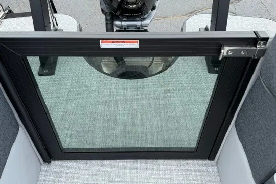 Slide: The Image of Alera M25Q 2027 boat with glass panel and secure latch mechanism. - 28