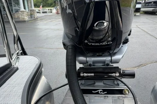 Slide: The Image of Alera M25Q 2027 boat engine, featuring Verado branding, in a parking lot setting. - 20