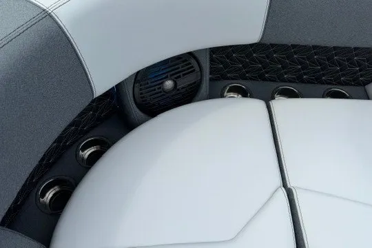 Slide: The Image of Luxurious interior of 2027 Alera M25Q with sleek seating and integrated speaker system. - 80