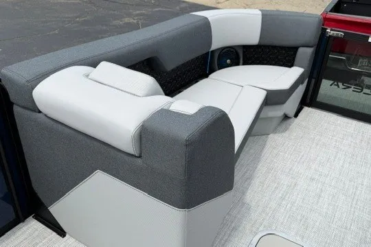 Slide: The Image of Luxurious seating in a 2027 Alera M25Q boat, featuring modern gray and white upholstery. - 68