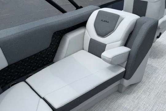 Slide: The Image of Luxurious seating in the 2027 Alera M25Q boat, featuring sleek gray and white upholstery. - 81