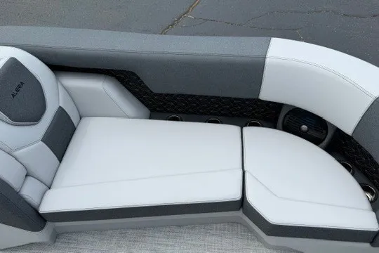 Slide: The Image of Luxurious seating in 2027 Alera M25Q boat, featuring sleek gray and white upholstery. - 65