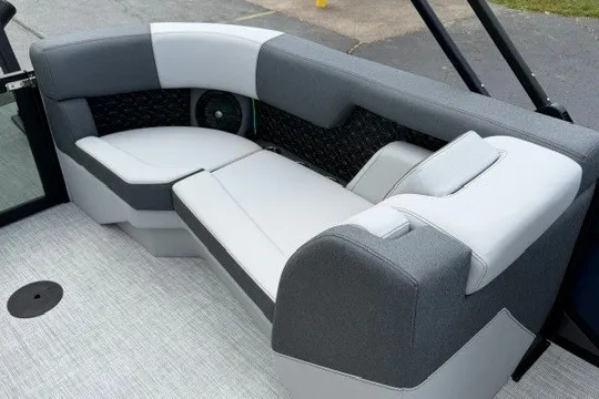 Slide: The Image of Luxurious seating on 2027 Alera M25Q boat, featuring modern gray and white upholstery. - 76