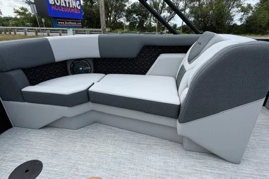 Slide: The Image of Luxurious seating on 2027 Alera M25Q boat, featuring modern gray and white upholstery. - 77
