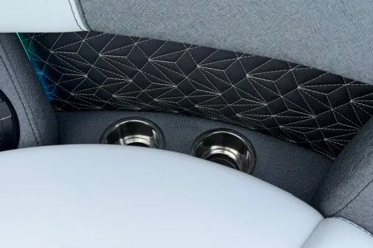 Slide: The Image of Luxurious Alera M25Q 2027 interior with geometric stitching and dual cup holders. - 30