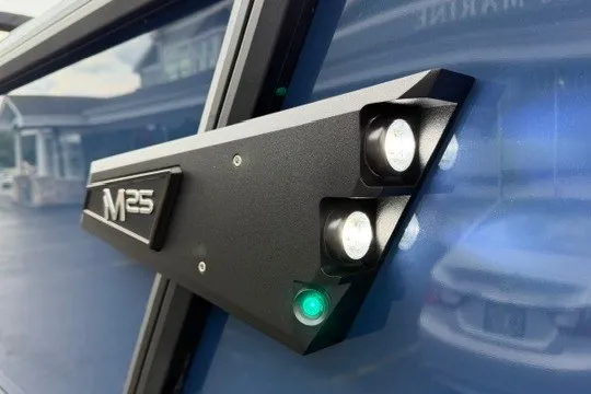 Slide: The Image of Close-up of Alera M25Q 2027 model with LED lights on a sleek black panel. - 3