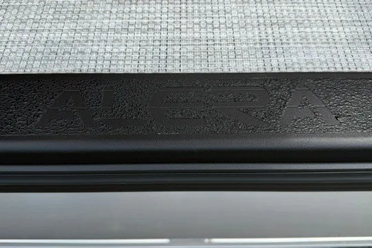 Slide: The Image of Close-up of Alera M25Q 2027 model logo on textured surface. - 72