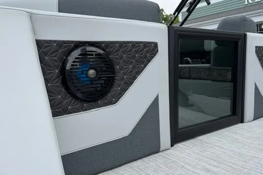 Slide: The Image of 2027 Alera M25Q boat interior with stylish speaker and modern design elements. - 13