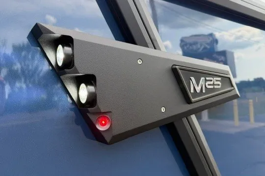 Slide: The Image of Alera M25Q 2027 model with sleek design and LED lights on a blue surface. - 2