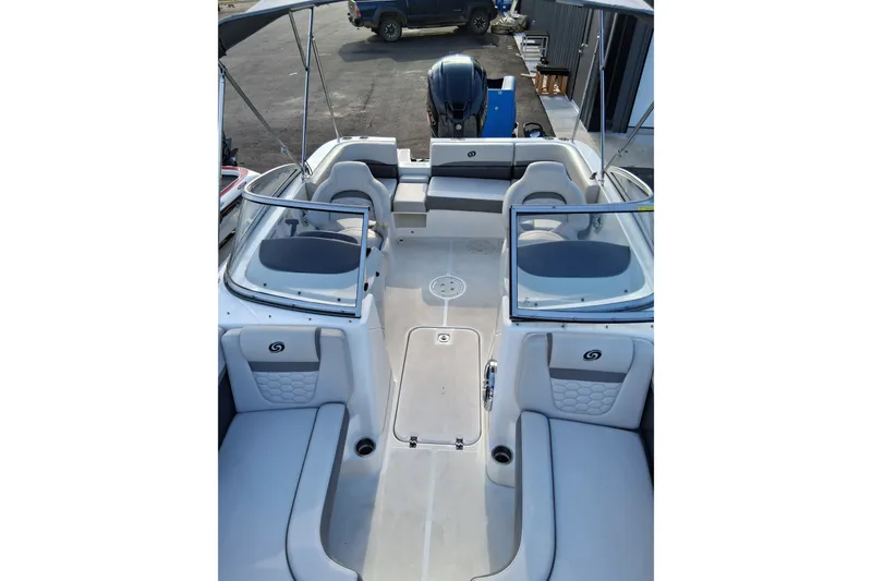 Slide: The Image of 2024 Hurricane SunDeck 191 OB boat interior with spacious seating and modern design. - 19