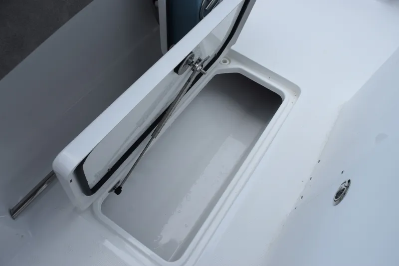Slide: The Image of Open storage compartment on 2027 Sea Hunt Gamefish 28CB boat. - 25