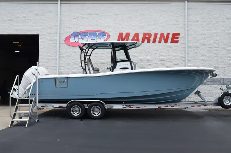 The Image of 2027 Sea Hunt Gamefish 28CB boat on trailer at GSPS Marine dealership. - 1