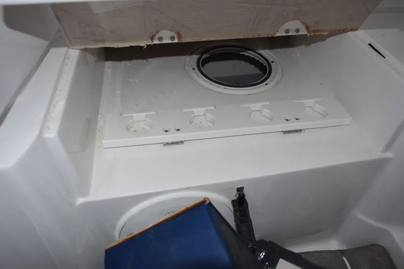 Slide: The Image of Interior view of 2027 Sea Hunt Gamefish 28CB boat, featuring storage compartments. - 21