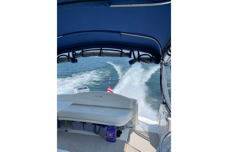 Slide: The Image of 2000 Sea Ray 380 Sundancer cruising on open water, view from the deck. - 12