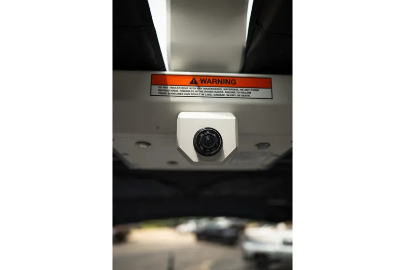 Slide: The Image of 2023 Supra SL 450 camera system with warning label, enhancing safety features. - 36