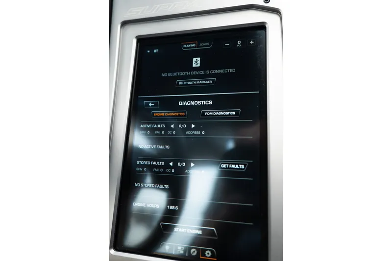 Slide: The Image of 2023 Supra SL 450 dashboard display showing diagnostics and Bluetooth connectivity options. - 21