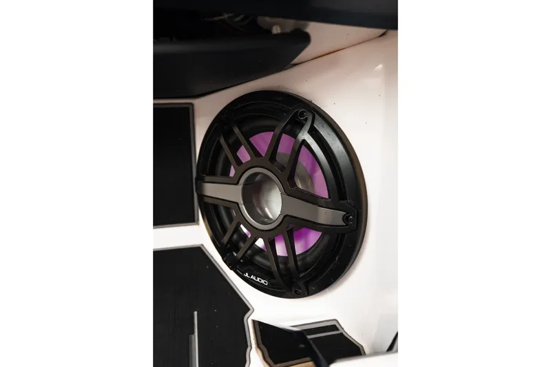 Slide: The Image of Speaker system in 2023 Supra SL 450 with purple lighting. - 22