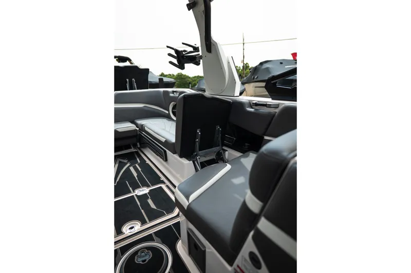 Slide: The Image of Interior of 2023 Supra SL 450 boat with sleek seating and modern design elements. - 20