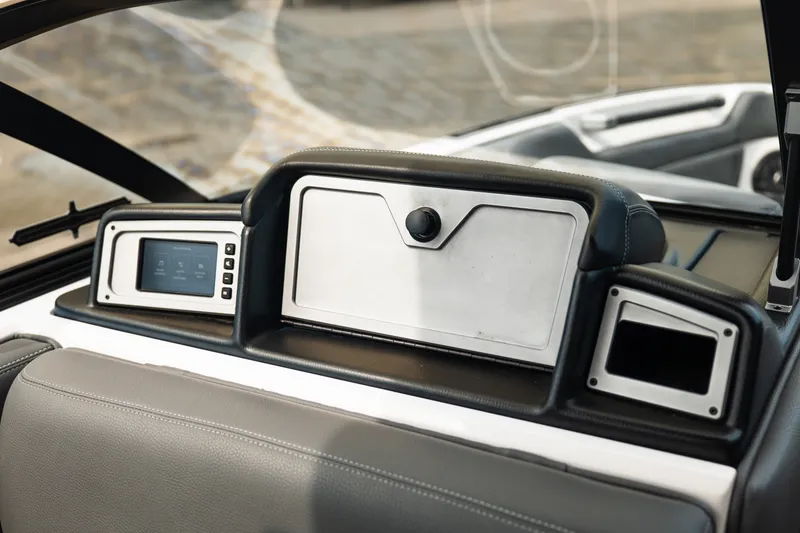 Slide: The Image of 2023 Supra SL 450 dashboard featuring modern controls and sleek design elements. - 28