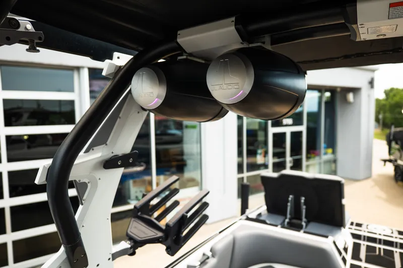 Slide: The Image of 2023 Supra SL 450 boat with JL Audio speakers and wakeboard rack. - 30