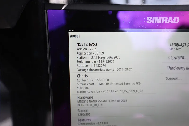 Slide: The Image of Simrad NSS12 evo3 display on 2020 Sea Pro 239 Center Console boat, showing system information. - 22