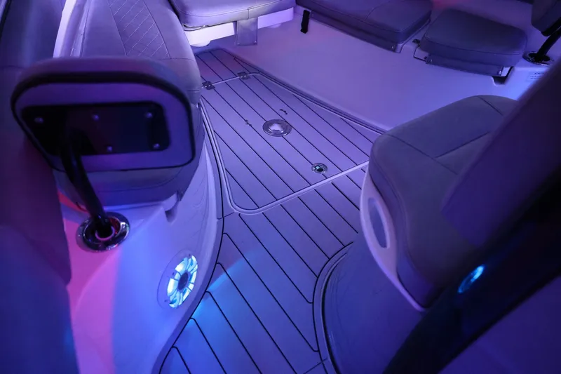 Slide: The Image of Interior of 2020 Sea Pro 239 Center Console boat with ambient lighting. - 24