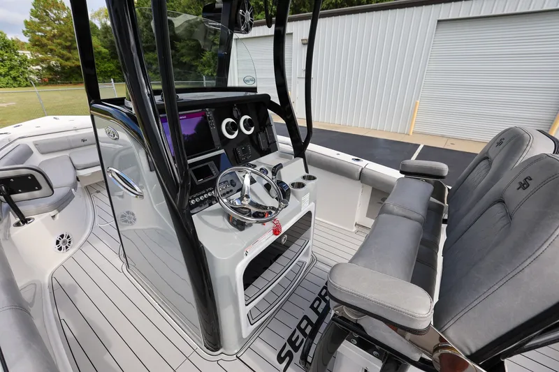 Slide: The Image of 2020 Sea Pro 239 Center Console boat interior with modern helm and seating. - 10