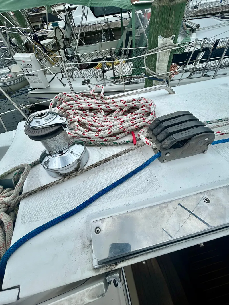 Slide: The Image of Deck of a Hunter 41 Aft Cockpit with ropes and a winch. - 33
