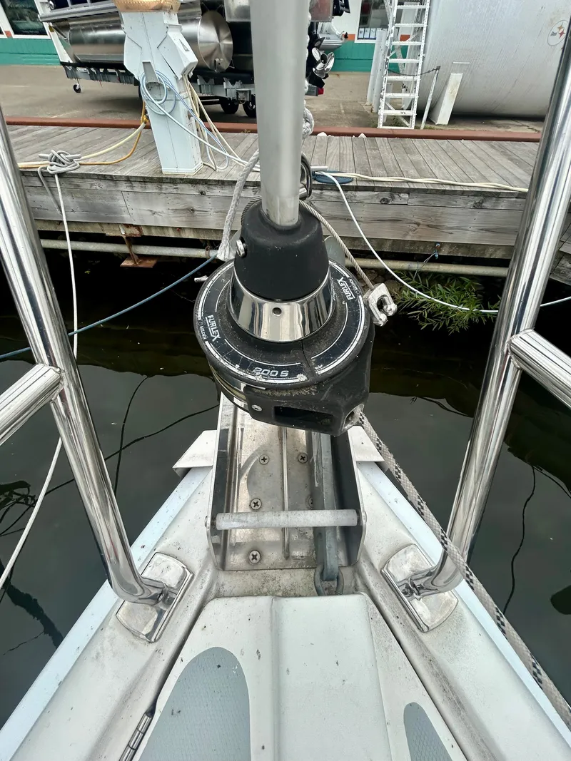 Slide: The Image of Bow view of a 2005 Hunter 41 Aft Cockpit with anchor windlass and ropes. - 30