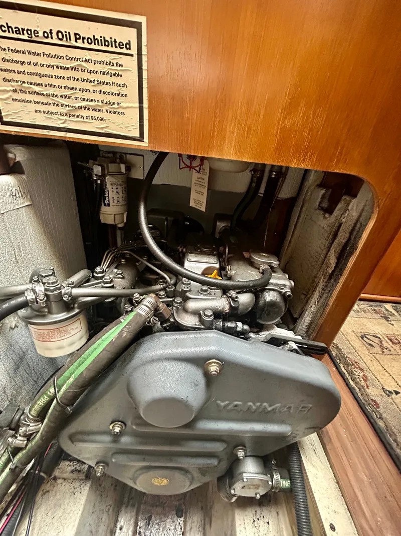 Slide: The Image of Engine compartment of a 2005 Hunter 41 Aft Cockpit with a Yanmar engine. - 18