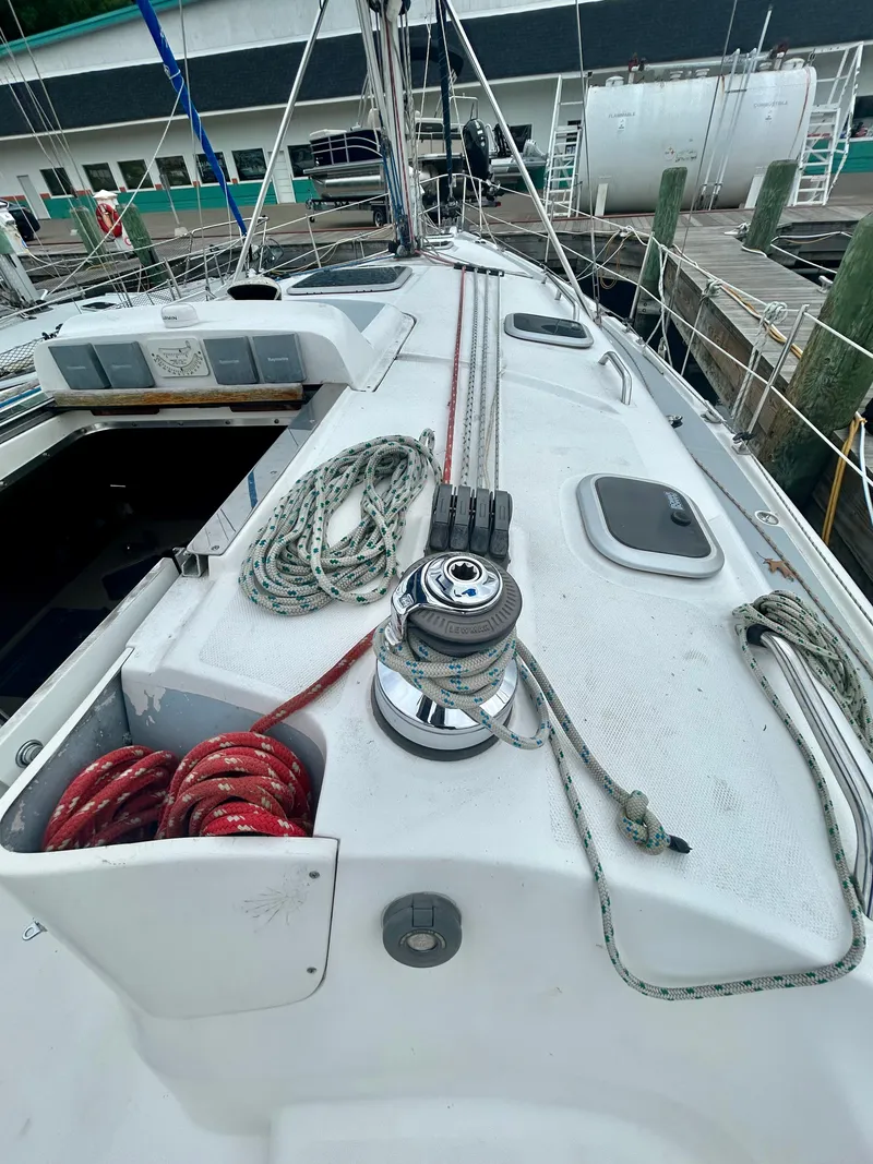 Slide: The Image of Deck of a 2005 Hunter 41 Aft Cockpit with ropes and a winch. - 27
