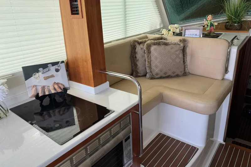 Slide: The Image of Interior of 2021 Back Cove 41 yacht with cozy seating and modern kitchen amenities. - 26