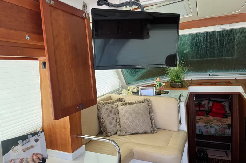 Slide: The Image of Interior of a 2021 Back Cove 41 yacht with TV, seating, and decor. - 27