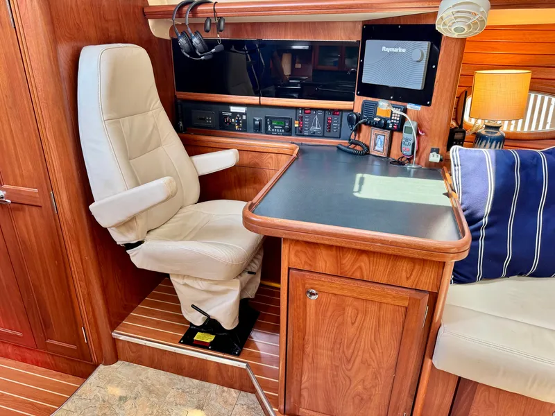 Slide: The Image of Interior of the 2009 Hunter 50 Center Cockpit with a comfortable seat and modern electronics. - 41