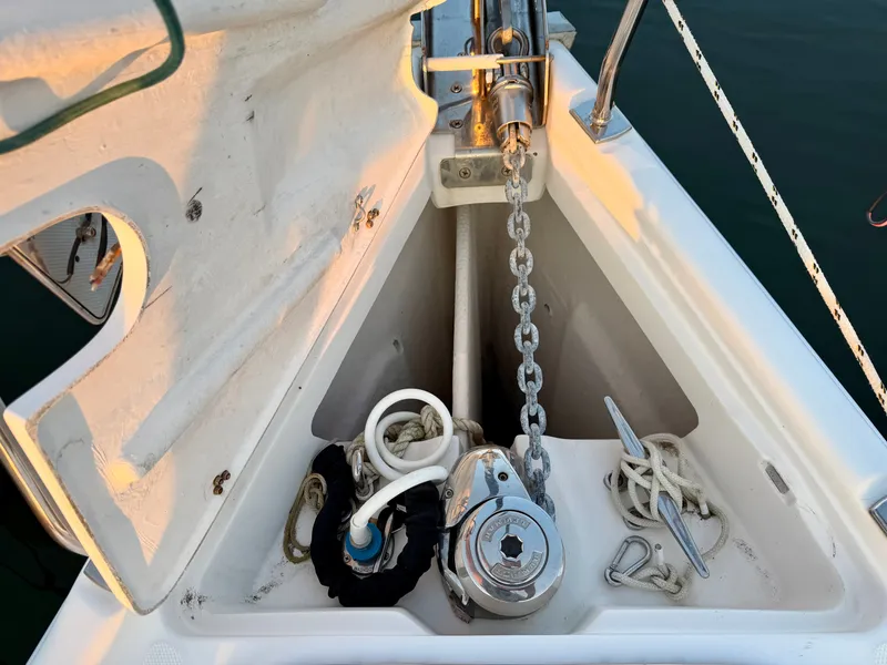 Slide: The Image of Anchor locker of a 2009 Hunter 50 Center Cockpit with chain and ropes. - 28