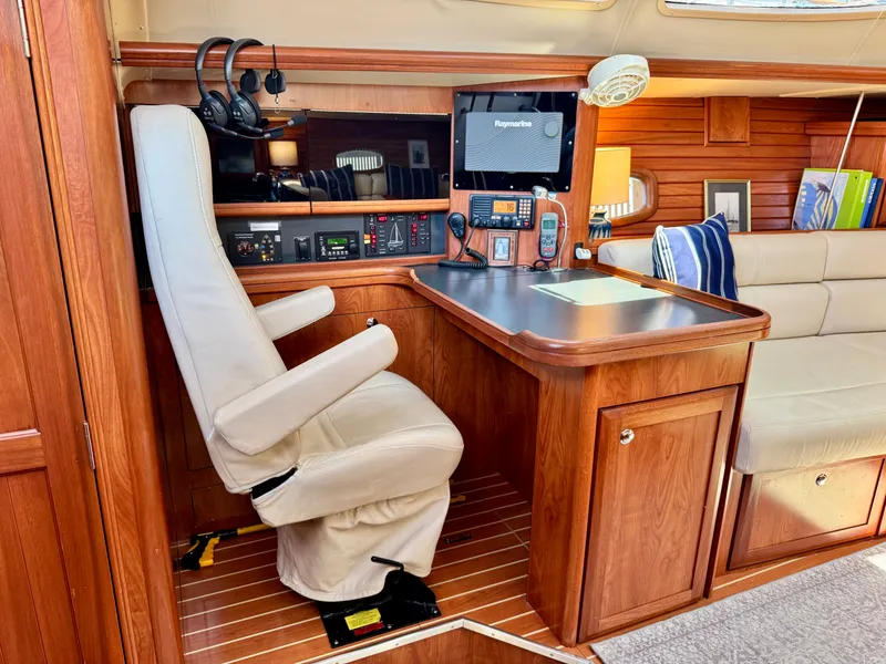 Slide: The Image of Interior of the 2009 Hunter 50 Center Cockpit with navigation station and comfortable seating. - 42
