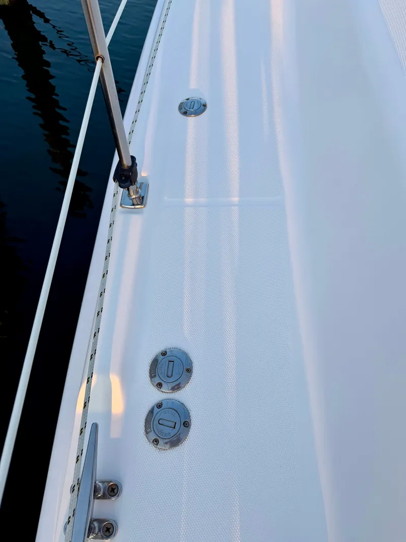 Slide: The Image of Deck of a 2009 Hunter 50 Center Cockpit with stainless steel fittings. - 32