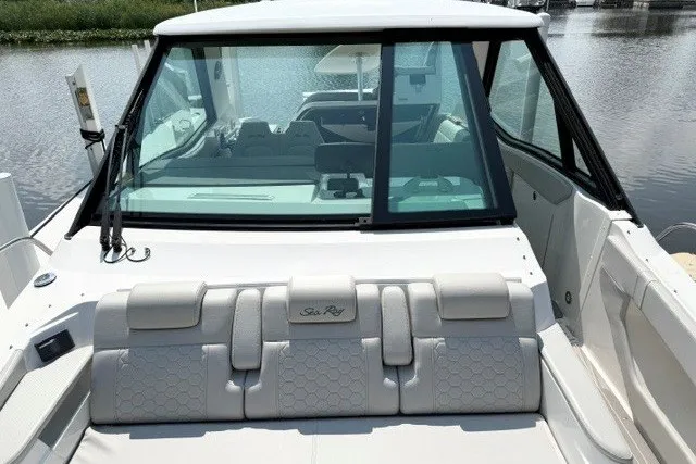 Slide: The Image of 2022 Sea Ray Sundancer 320 boat with sleek design and comfortable seating on the water. - 20