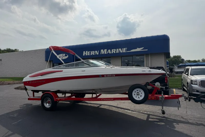 The Image of 2011 Crownline 21 SS boat on trailer outside Hern Marine dealership. - 0