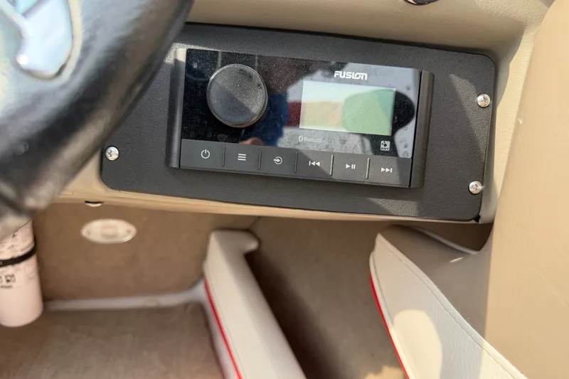 Slide: The Image of Fusion audio system in 2011 Crownline 21 SS boat dashboard. - 11