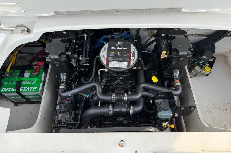 Slide: The Image of 2011 Crownline 21 SS boat engine compartment with MerCruiser 4.3L engine and Interstate battery. - 16