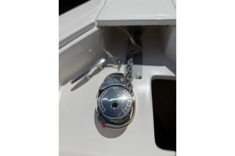 Slide: The Image of Close-up of a 2022 Regal 33 OBX boat's anchor winch system. - 36