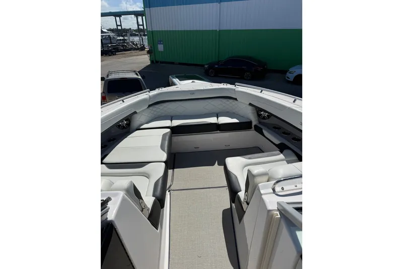 Slide: The Image of 2022 Regal 33 OBX boat interior with spacious seating and modern design. - 31