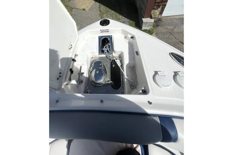 Slide: The Image of 2020 Chaparral 297 SSX boat anchor compartment, open and detailed view. - 13