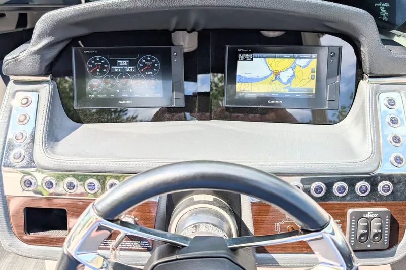 Slide: The Image of Dashboard of 2020 Chaparral 297 SSX boat with Garmin navigation displays. - 4
