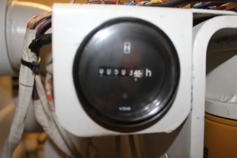 Slide: The Image of Close-up of an hour meter on a 1989 Californian 55 Cockpit Motor Yacht. - 19